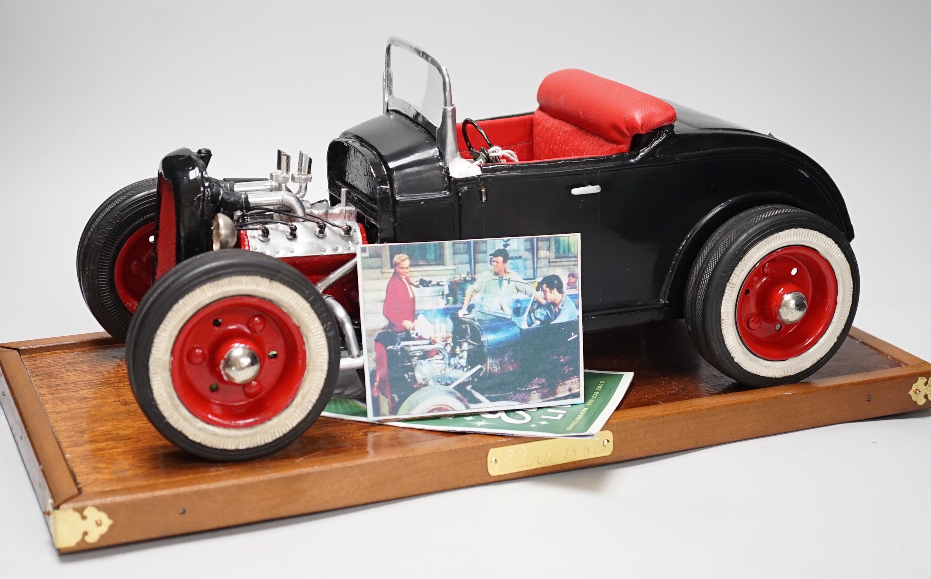 A scratch built model of Elvis Presley's Ford Coupe. 49cm wide